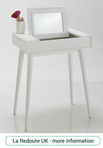 Small and compact dressing table with fold down mirror to create a desk with wide work surface.