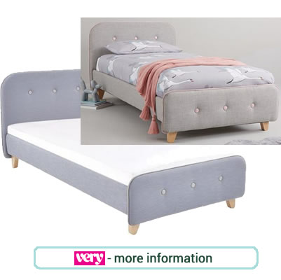 Grey single bed with padded head and footboards with button detail.