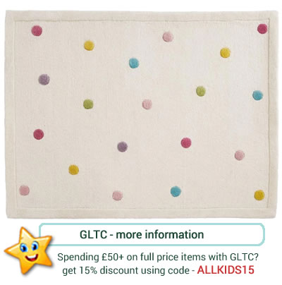 Natural, 100% wool. Children's bedroom rug with pastel polka dots.