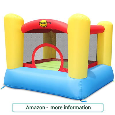 Small, blue, red and yellow bouncy castle with netted sides.