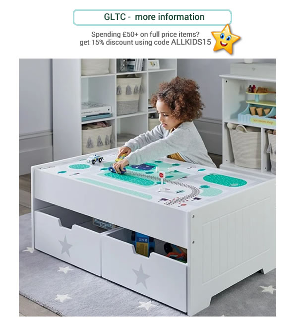 White and low, Bodmin Play Table with storage drawer and reversible lid. Large play area.